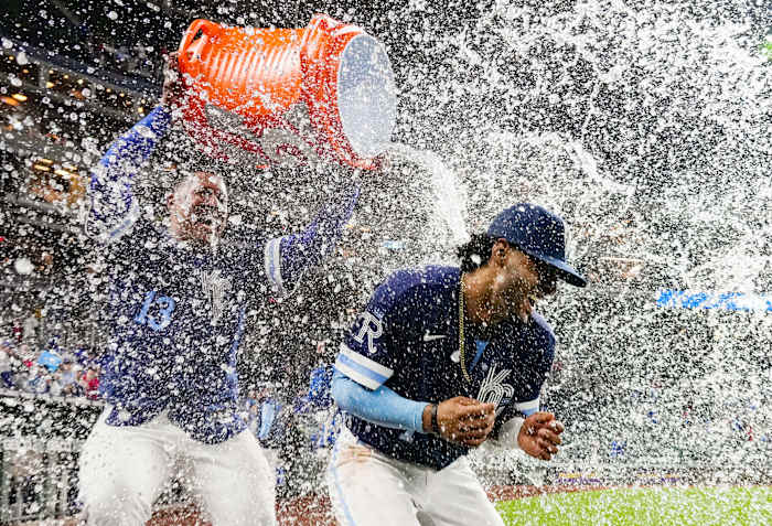 May 3, 2022; Kansas City, Missouri, USA; Kansas City Royals designated hitter MJ Melendez (1) is doused with water by Kansas City Royals catcher Salvador Perez (13) after defeating the St. Louis Cardinals at Kauffman Stadium. Mandatory Credit: Jay Biggerstaff-USA TODAY Sports
